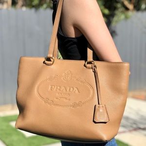 prada embossed logo